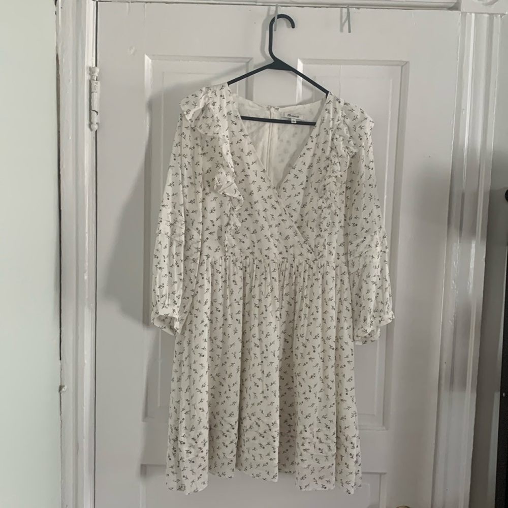 Madewell floral dress. Light material with ruffles on sleeves and at shoulders.